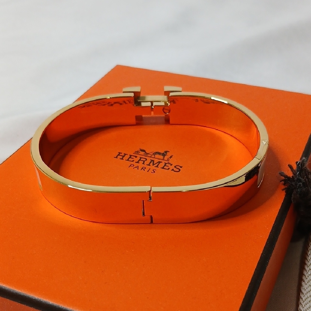 Hermes Gold-Tone and White Enamel Clic H Bracelet - Picture 4 of 4
